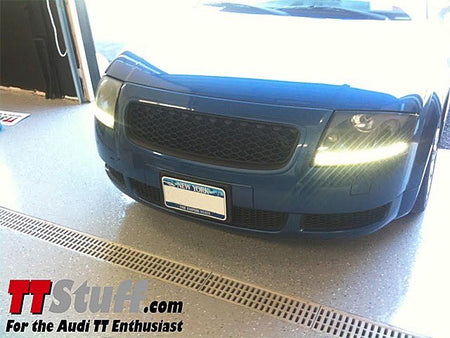 Audi TT Mk1 front profile with German Auto Stuff gloss black RS-style honeycomb grille installed in a badgeless configuration